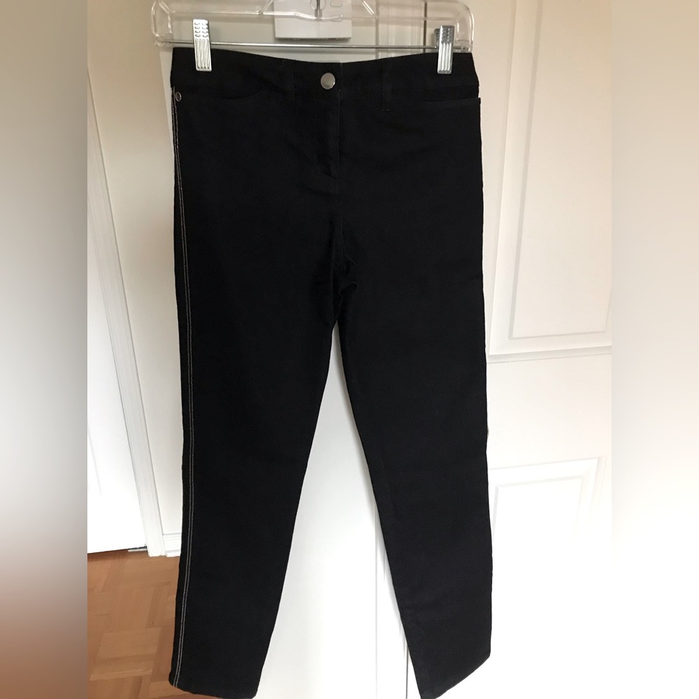 Dark blue Georges Rech jeans with subtil gold lines on the side